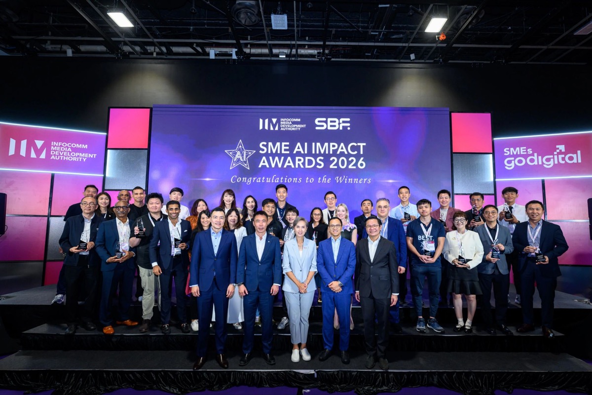 Winners of IMDA's SME AI Impact Awards 2026 on stage in Singapore, holding their awards